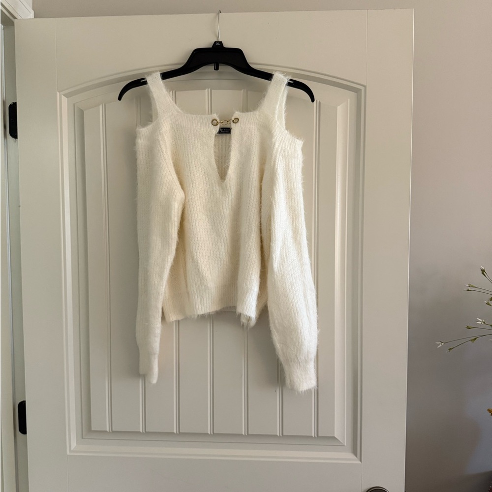 White fluffy sweater with cut-out neckline and drop shoulder sleeves